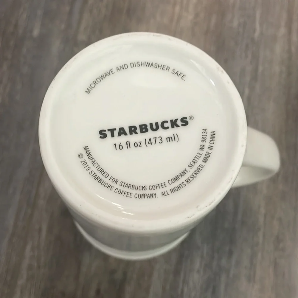 Starbucks Coffee Mug 2019, Tall 16 Oz. Christmas Tree on Light Blue Background.
